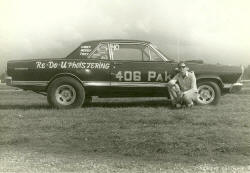 Larry Lyons showing off his "406 PAK" Hot Rod